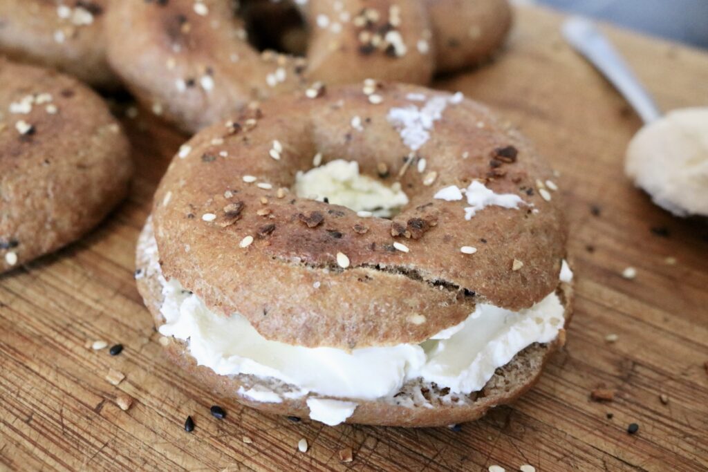 one healthy whole grain everything bagel sandwich with cream cheese