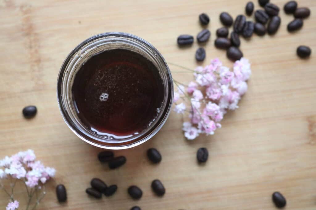 top view of homemade coffee syrup in a mason jar