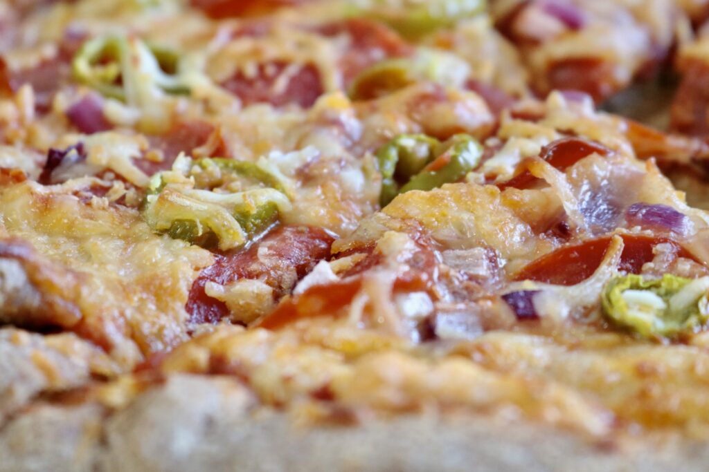 whole grain sourdough pizza cut in pieces